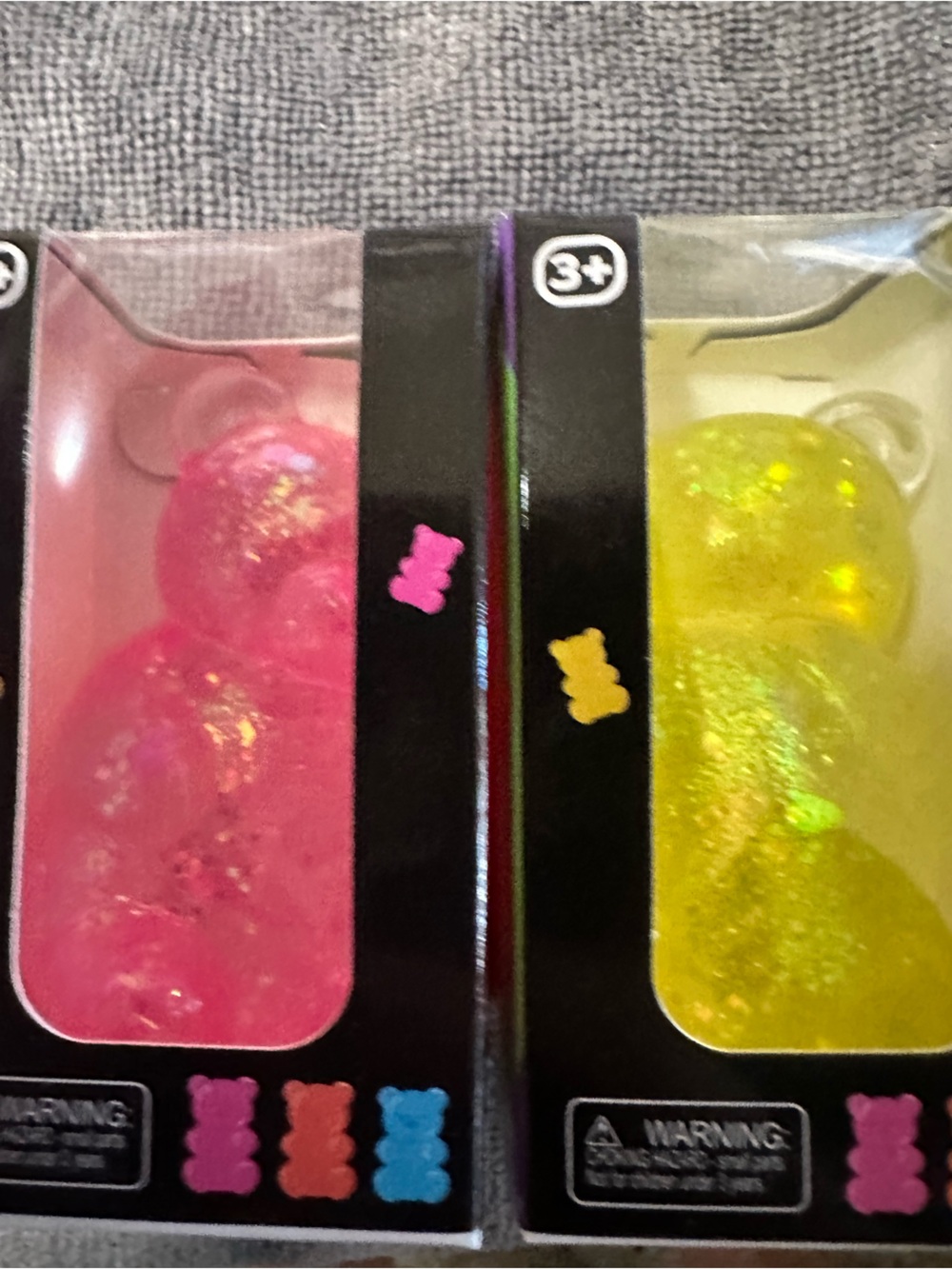 Pink and yellow sugar squish gummy bears slow rise.